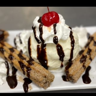 Churros w/ vanilla Ice cream