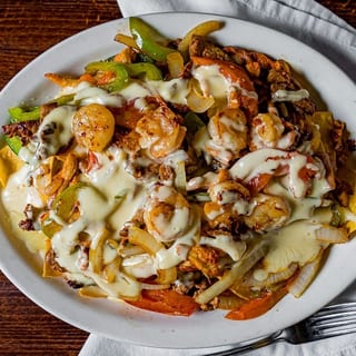 Nachos Fajita Maya (steak, shrimp, chicken)